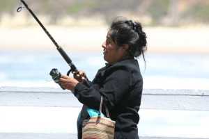 hispanic-woman-fishing-pismo-pier